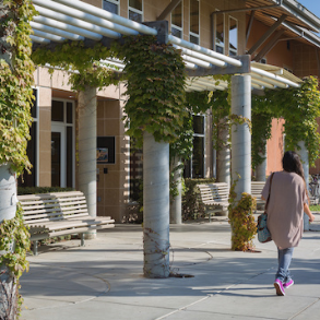 student walking outside Mariposa